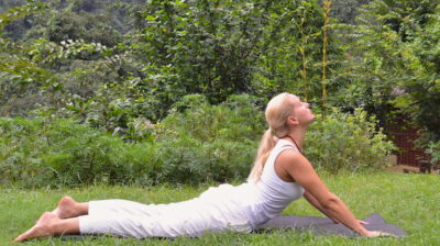 yoga poses - Liisa performing full Bhujangasana, the cobra pose